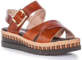 Sandalias Rieker para mujer con punta abierta y hebilla en corcho en marrón